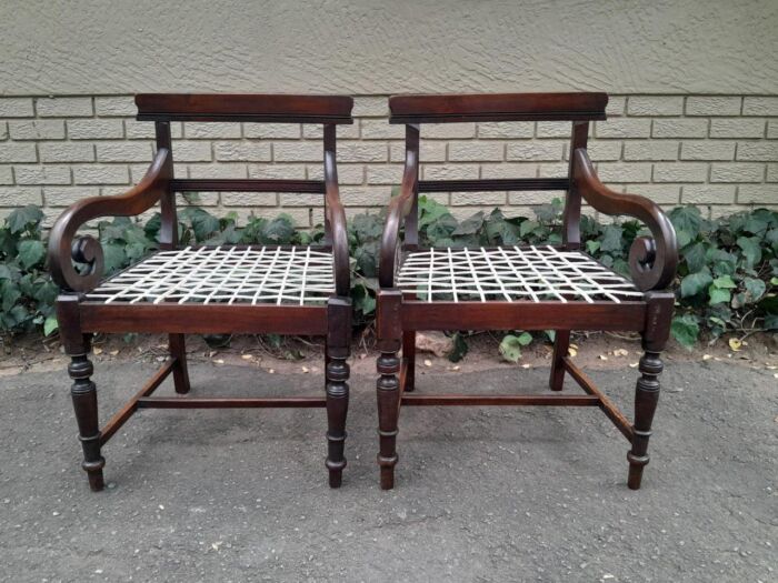 A 19th Century Set of Eight Cape Stinkwood Dining Charis with Riempie Seat Comprising Two Carvers and Six Dining Chairs  Provenance: The Tulbagh Saffer Collection - Image 6
