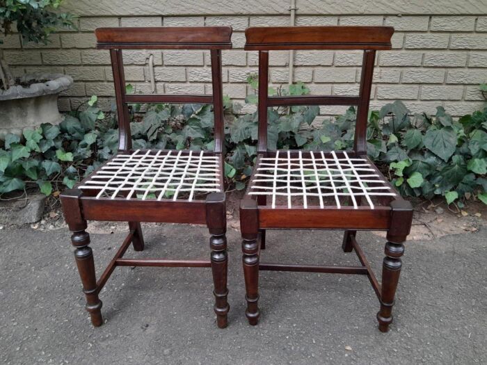 A 19th Century Set of Eight Cape Stinkwood Dining Charis with Riempie Seat Comprising Two Carvers and Six Dining Chairs  Provenance: The Tulbagh Saffer Collection - Image 7
