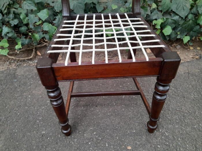 A 19th Century Set of Eight Cape Stinkwood Dining Charis with Riempie Seat Comprising Two Carvers and Six Dining Chairs  Provenance: The Tulbagh Saffer Collection - Image 10