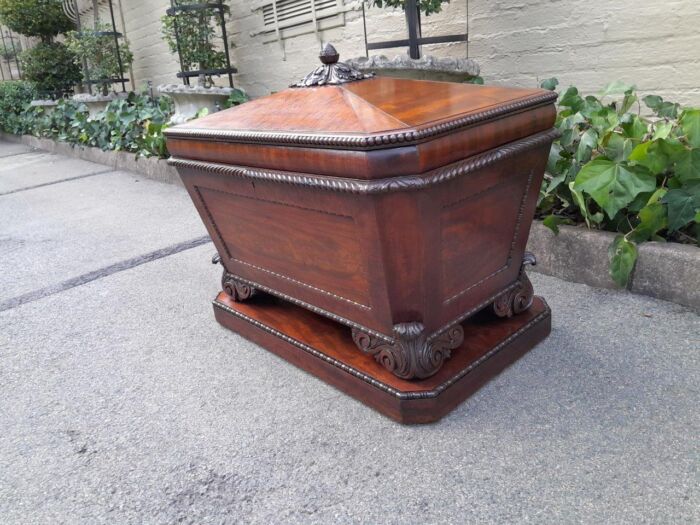 A 19th Century Flame Mahogany Wooden Carved  Cellarette on Carved Feet (Interior with Lead Lining for Wine Bottles and Ice) - Image 4
