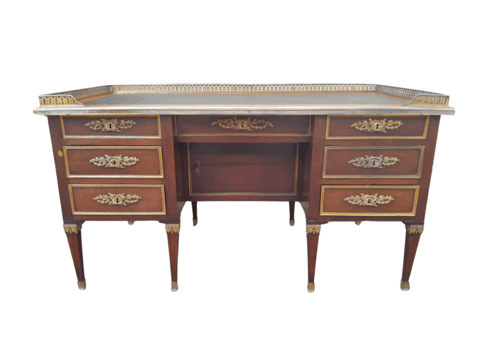A 20th Century French Empire Style Mahogany Desk with Leather and Gilt Tooling Writing Surface and Brass Gallery