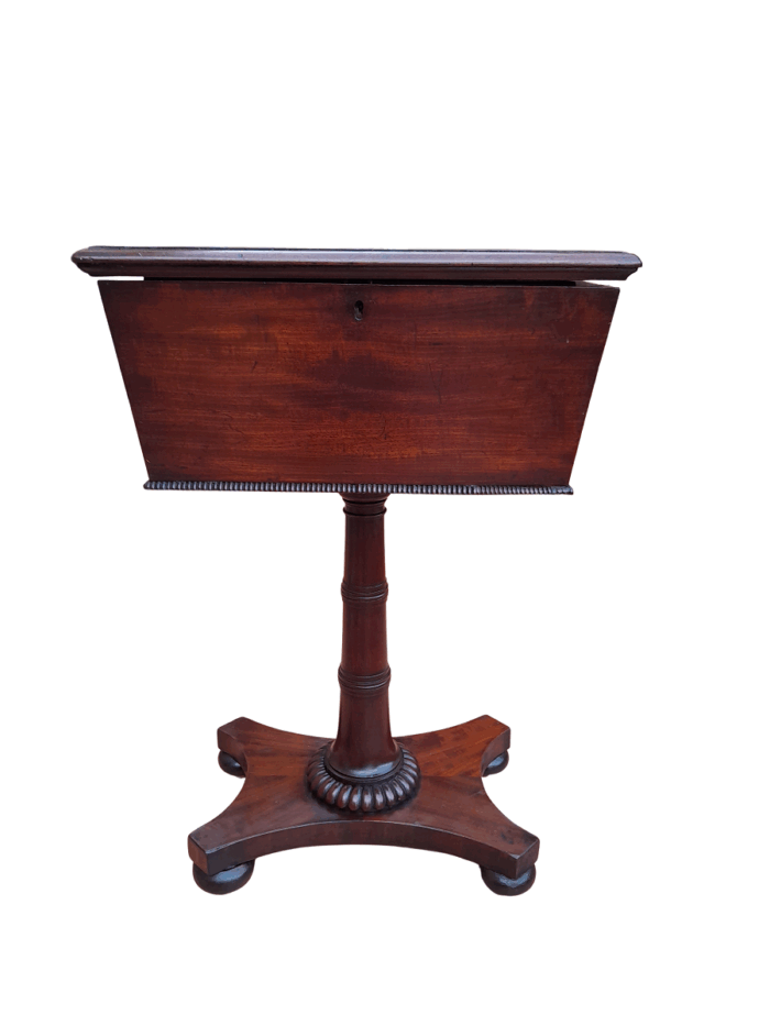 An Early 19th Century Regency Mahogany Tea Poy on Stand