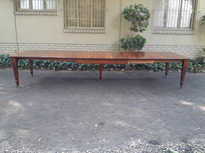 An Antique Edwardian Mahogany and Inlaid Dining Extension Table
