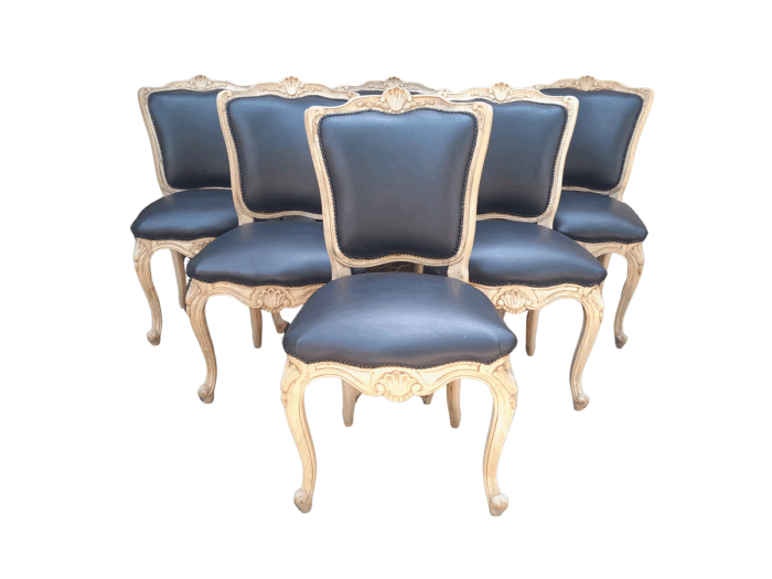 A 20th Set of Six French Style Dining Chairs in a Bleached Contemporary Finish and Upholstered in Leather