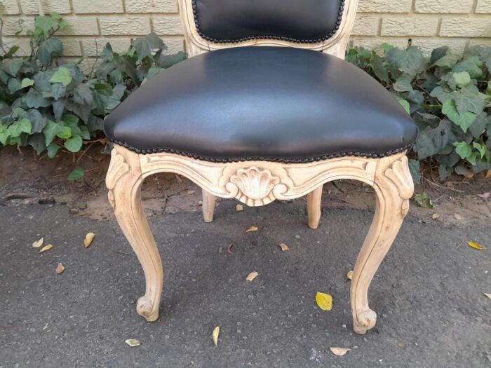 A 20th Set of Six French Style Dining Chairs in a Bleached Contemporary Finish and Upholstered in Leather - Image 8