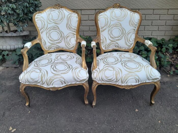 A 19th Century Pair of French Carved and Gilded Wooden Armchairs Upholstered in a Custom Made Fabric for The Crown Collection  - Image 2