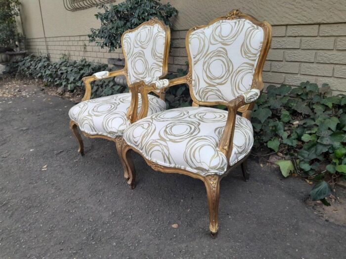 A 19th Century Pair of French Carved and Gilded Wooden Armchairs Upholstered in a Custom Made Fabric for The Crown Collection  - Image 4