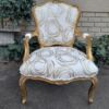 A 19th Century Pair of French Carved and Gilded Wooden Armchairs Upholstered in a Custom Made Fabric for The Crown Collection  - Image 6