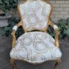 A 19th Century Pair of French Carved and Gilded Wooden Armchairs Upholstered in a Custom Made Fabric for The Crown Collection  - Image 7