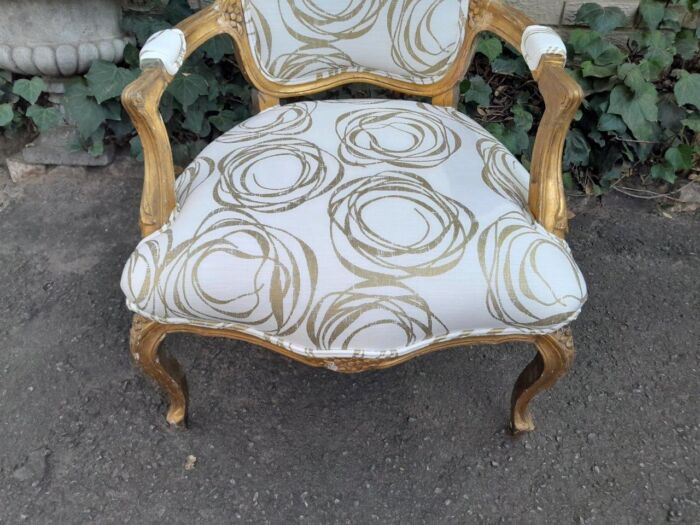 A 19th Century Pair of French Carved and Gilded Wooden Armchairs Upholstered in a Custom Made Fabric for The Crown Collection  - Image 9