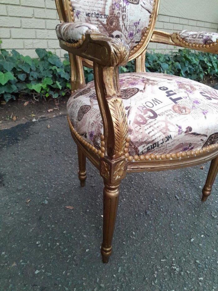A 20th Century French Louis XVI Style Pair of Ornately Carved Gold Armchairs - Image 5