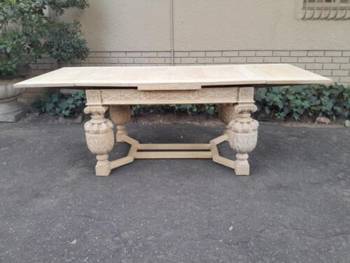 An Antique Ornately Carved French Style Oak  Extensions Table in a Contemporary Bleached Finish