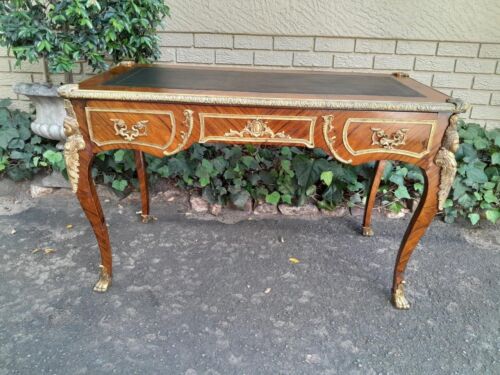 A Middle 20th Century French Louis XVI Style Rosewood Bureau / Plat / Desk With Gilt and Tooled Black Leather Writing Surface with Cast Brass Mounts and Drawer