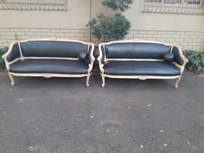 A 20th Century Pair of French Style Carved Walnut Settees in a Contemporary Bleached Finish and Upholstered in Leather with One Leather Decorative Ball Per Settee - Image 3