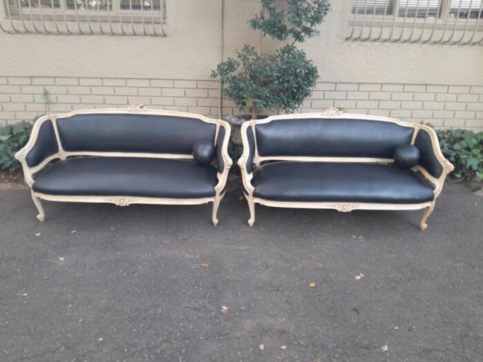 A 20th Century Pair of French Style Carved Walnut Settees in a Contemporary Bleached Finish and Upholstered in Leather with One Leather Decorative Ball Per Settee - Image 5