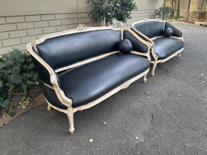 A 20th Century Pair of French Style Carved Walnut Settees in a Contemporary Bleached Finish and Upholstered in Leather with One Leather Decorative Ball Per Settee - Image 9
