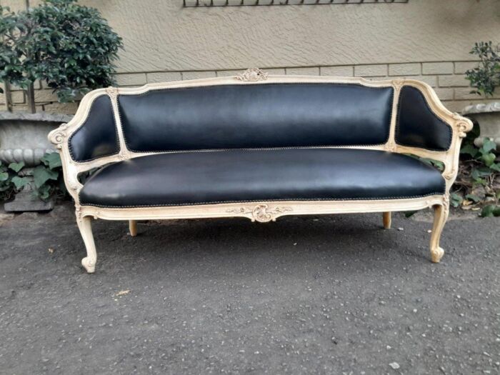 A 20th Century Pair of French Style Carved Walnut Settees in a Contemporary Bleached Finish and Upholstered in Leather with One Leather Decorative Ball Per Settee - Image 11