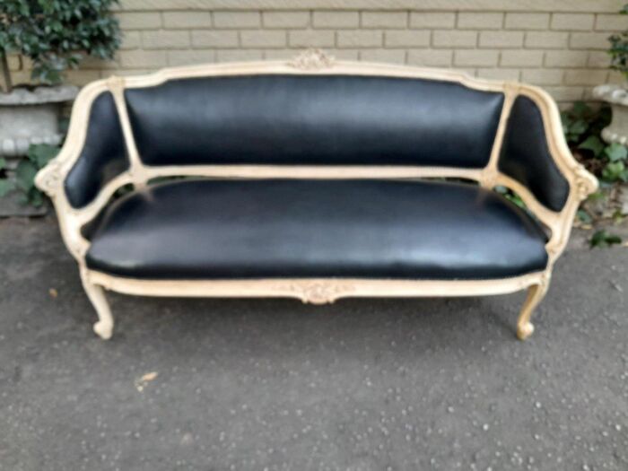 A 20th Century Pair of French Style Carved Walnut Settees in a Contemporary Bleached Finish and Upholstered in Leather with One Leather Decorative Ball Per Settee - Image 12
