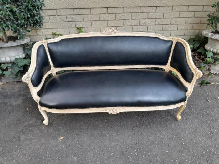 A 20th Century Pair of French Style Carved Walnut Settees in a Contemporary Bleached Finish and Upholstered in Leather with One Leather Decorative Ball Per Settee - Image 13