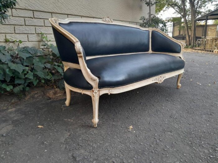 A 20th Century Pair of French Style Carved Walnut Settees in a Contemporary Bleached Finish and Upholstered in Leather with One Leather Decorative Ball Per Settee - Image 14