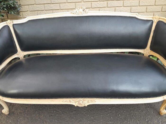 A 20th Century Pair of French Style Carved Walnut Settees in a Contemporary Bleached Finish and Upholstered in Leather with One Leather Decorative Ball Per Settee - Image 17