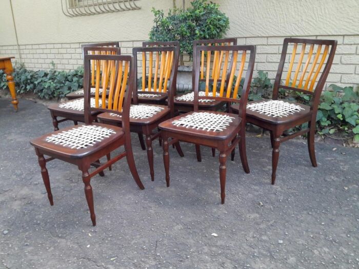 A Late 19thCentury  Early 20th Century Yellowwood Dining Table  with A 20th Century Set of Eight (8) Cape Stinkwood and Yellowwood Riempie Dining Chairs - Image 7