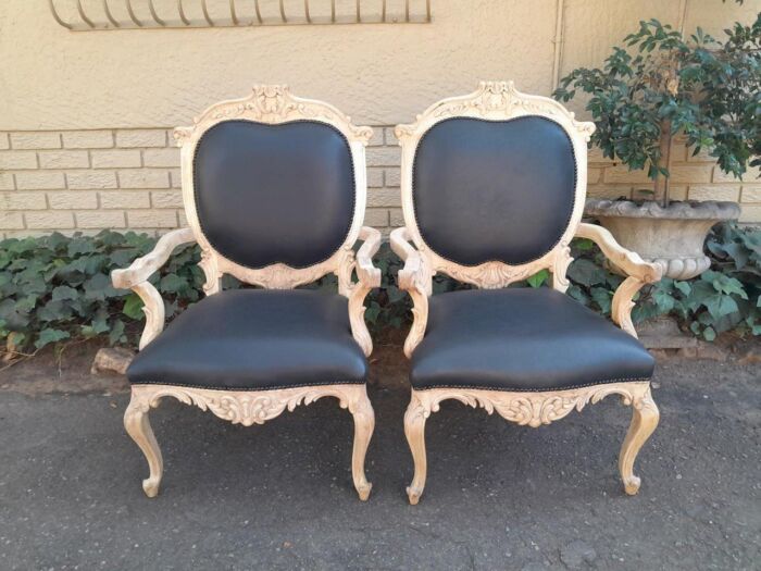 A 20th Century Pair Of French Style Carved Oak Armchairs In A Contemporary Bleached Finish And Upholstered In Leather - Image 3
