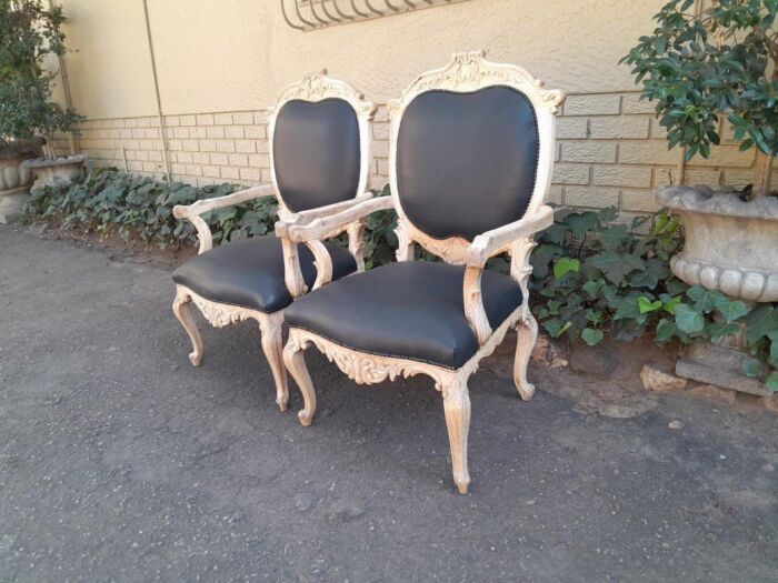 A 20th Century Pair Of French Style Carved Oak Armchairs In A Contemporary Bleached Finish And Upholstered In Leather - Image 5