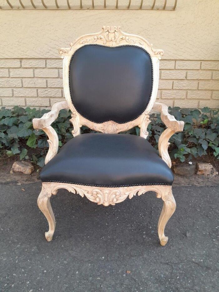 A 20th Century Pair Of French Style Carved Oak Armchairs In A Contemporary Bleached Finish And Upholstered In Leather - Image 6