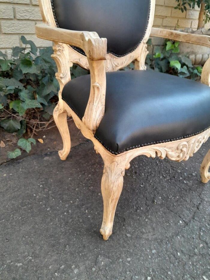 A 20th Century Pair Of French Style Carved Oak Armchairs In A Contemporary Bleached Finish And Upholstered In Leather - Image 8