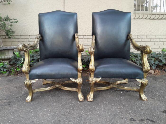 A 20th Century French Style Ornately Carved Pair Of Arm Chairs Hand Gilded And Upholstered In A Deep Buttoned Leather - Image 3