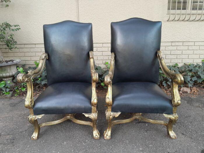 A 20th Century French Style Ornately Carved Pair Of Arm Chairs Hand Gilded And Upholstered In A Deep Buttoned Leather - Image 4