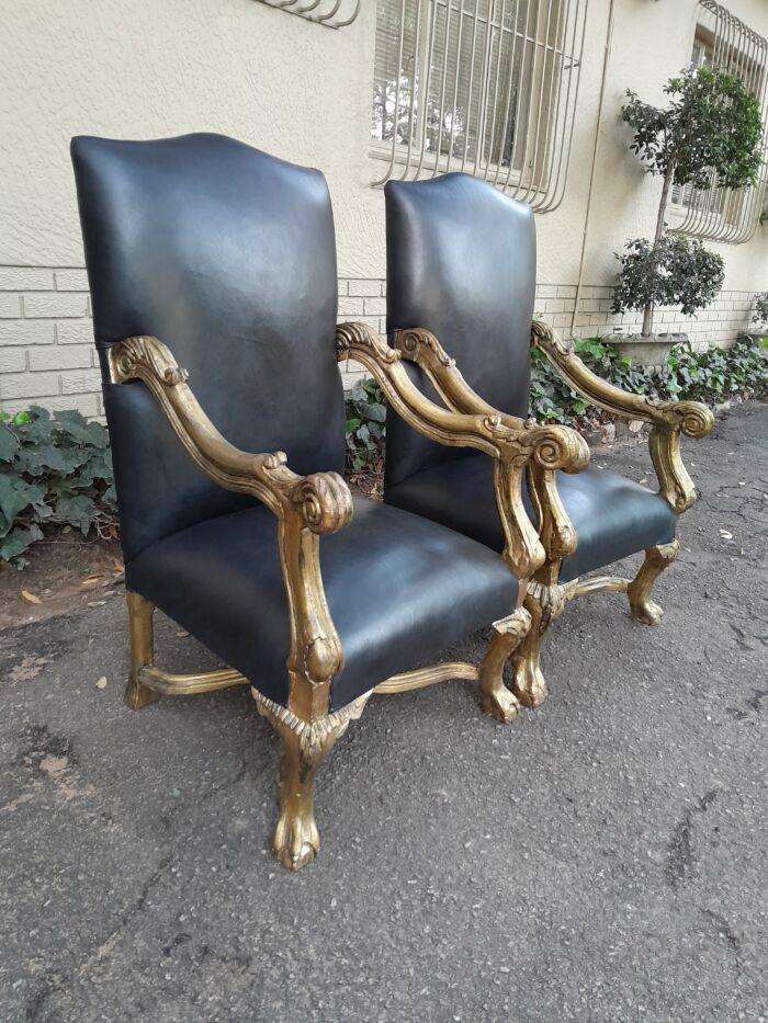 A 20th Century French Style Ornately Carved Pair Of Arm Chairs Hand Gilded And Upholstered In A Deep Buttoned Leather - Image 5