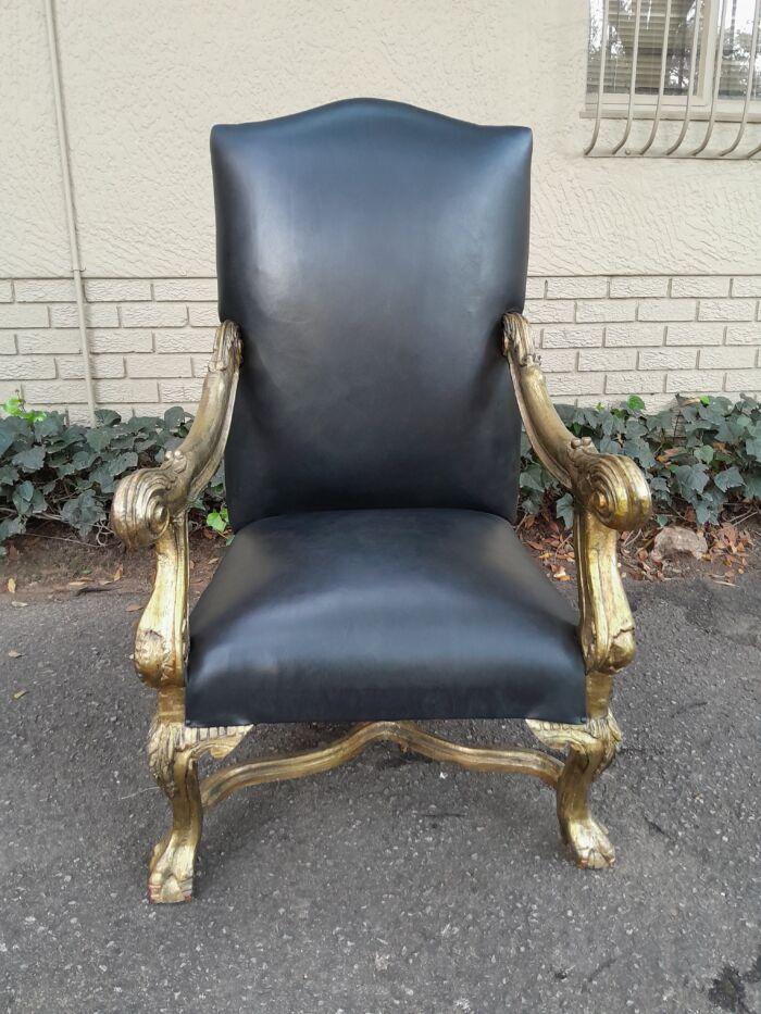 A 20th Century French Style Ornately Carved Pair Of Arm Chairs Hand Gilded And Upholstered In A Deep Buttoned Leather - Image 6