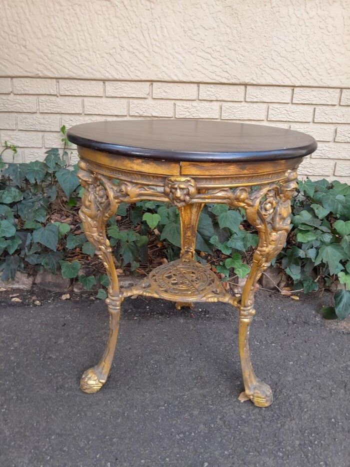 A 19th Century Pair of Original Victorian Britannia  Cast Iron Pub Tables with Teak Wooden Tops In a Contemporary Hand Gilded Finish - Image 7