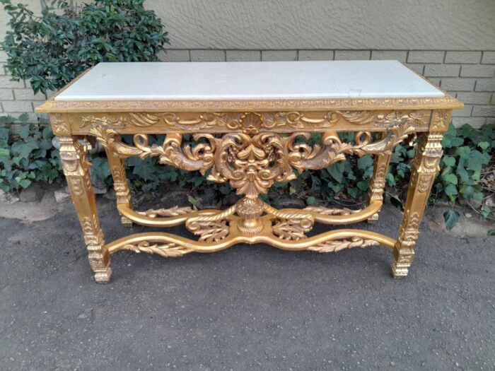 A 20th Century Ornately Carved and Hand-Gilded Console Table with Cream Marble Top - Image 4