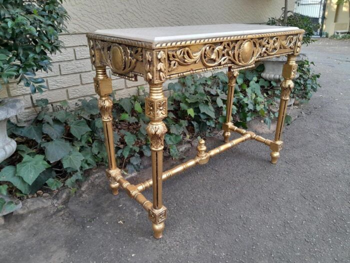 A 20th Century Ornately Carved and Hand-Gilded Console Table with Cream Marble Top - Image 6