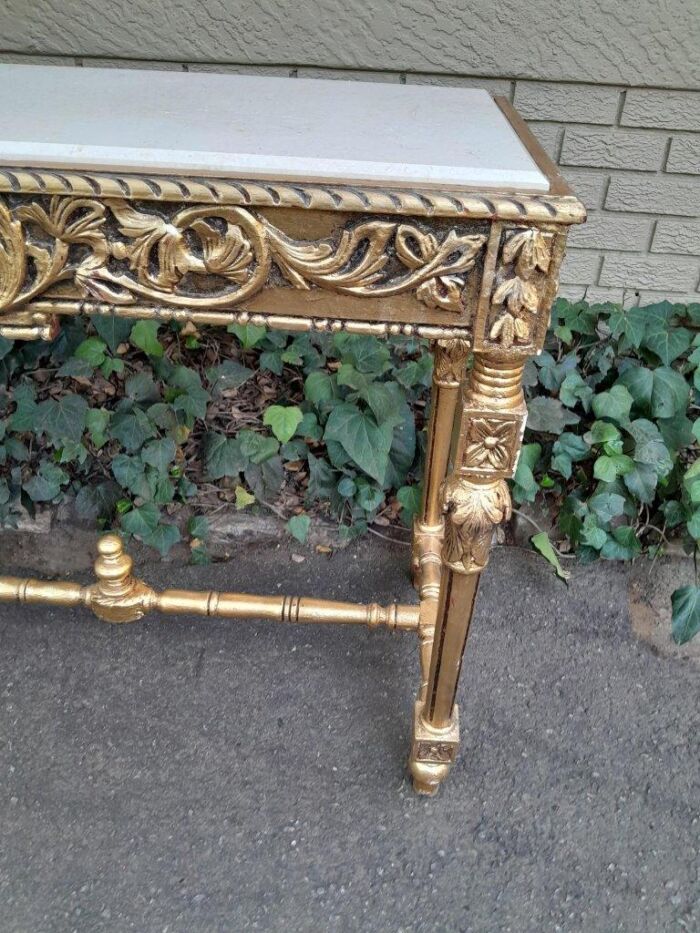 A 20th Century Ornately Carved and Hand-Gilded Console Table with Cream Marble Top - Image 8