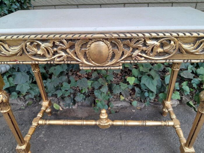 A 20th Century Ornately Carved and Hand-Gilded Console Table with Cream Marble Top - Image 9