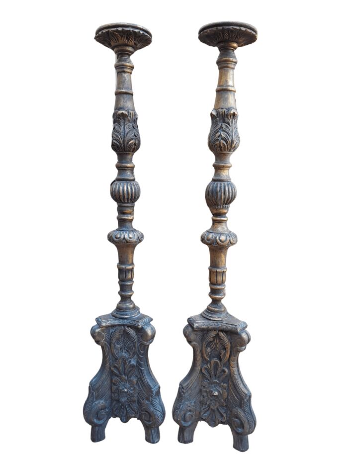A Pair Of French Style Carved And Gilded Floor Or Table Candle Holders