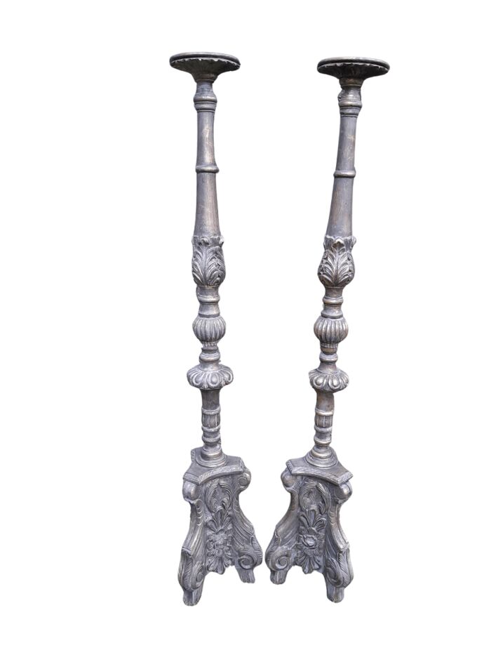 A Pair of French Style Carved and Gilded Floor or Table Candle Holders