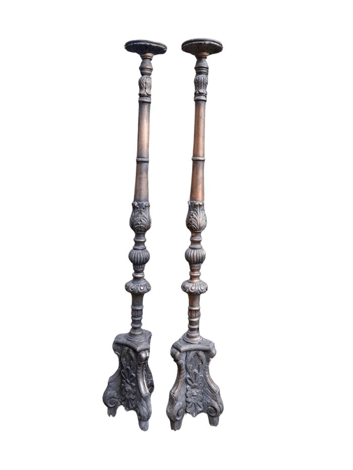A Pair of French Style Carved and Gilded Floor or Table Candle Holders