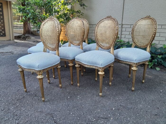 A Set of Eight French Style Carved Balloon and Rattan Back Chairs Upholstered in a Contemporary Fabric - Image 5