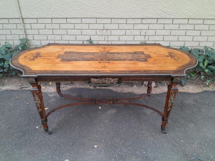 A Napoleon Marquetry Table On Castors - Image 2
