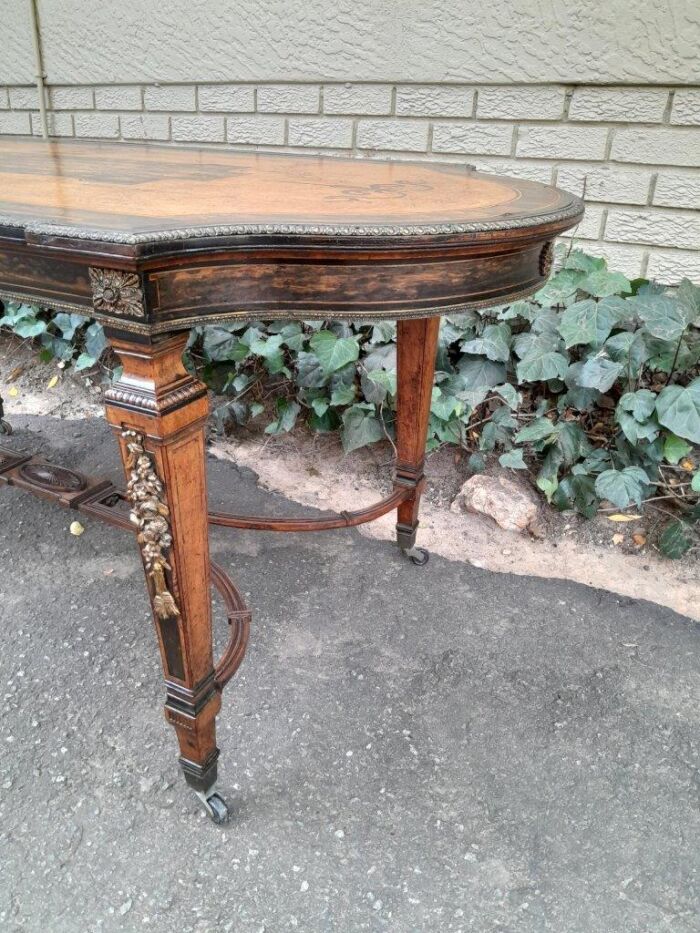 A Napoleon Marquetry Table On Castors - Image 8