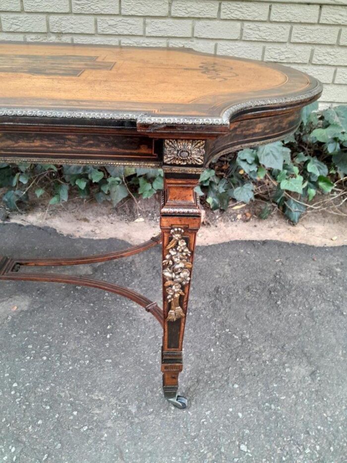 A Napoleon Marquetry Table On Castors - Image 9