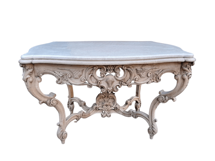 A 19th Century Ornately Carved Rococo Style Table with Marble Top in a Contemporary Bleached / Natural Finish