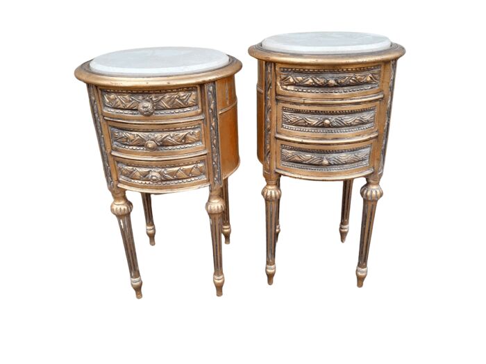 A Pair Of French Style Hand-Gilded Round Pedestals / Side Tables With Drawers And Cream Marble Tops