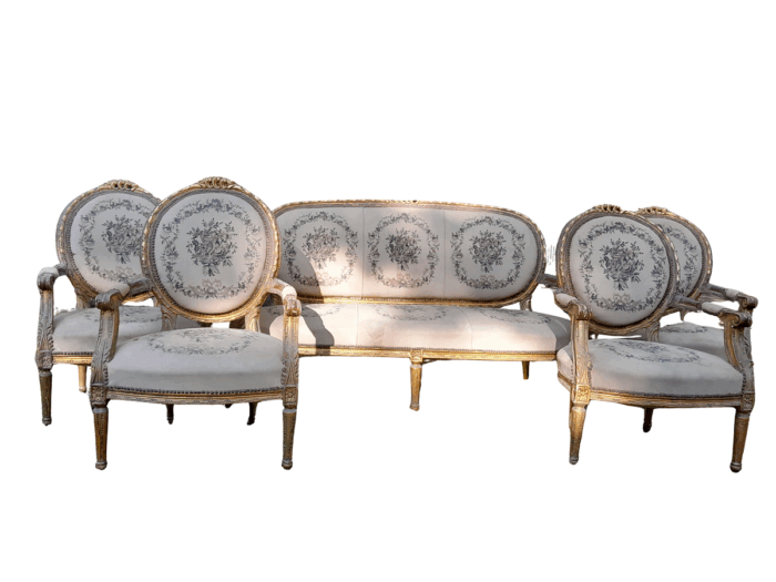 A 20th Century French Louis XVI Style Set of a Carved and Gilded Settee and Four Armchairs with Tapestry Fabric Settee