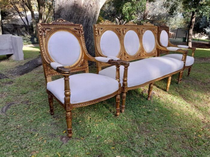 A 20th Century French Style Ornately Carved Gilt Wood Set Comprising a Settee and Pair of Armchairs - Image 6